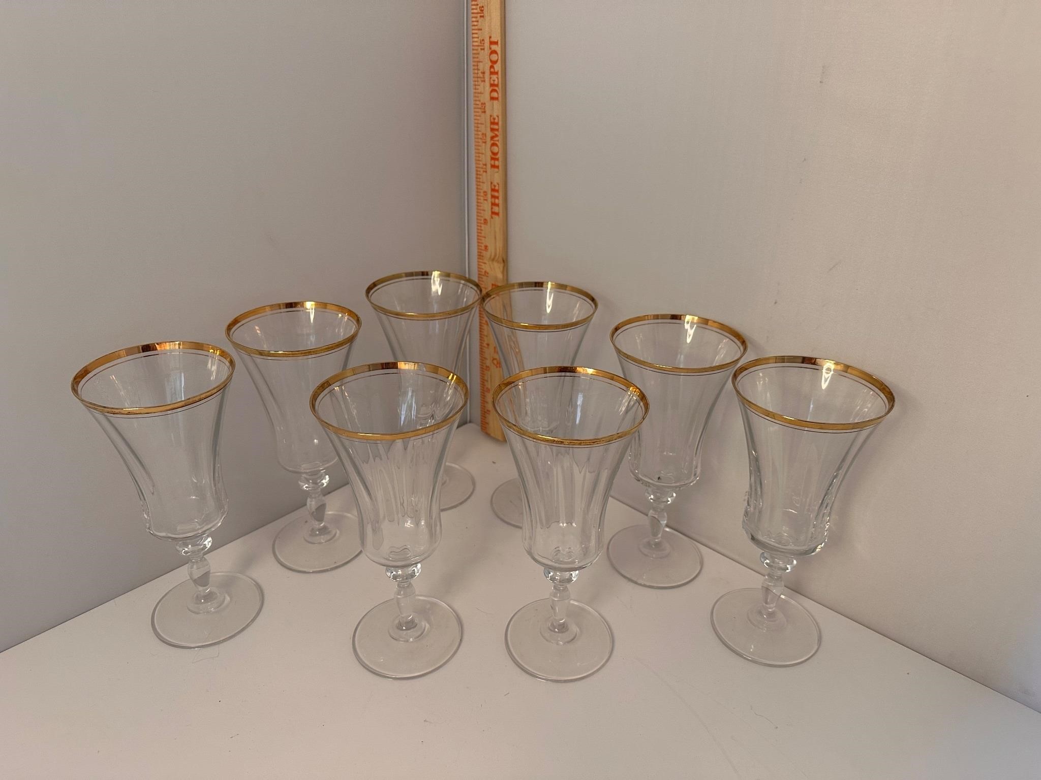 Set of 8 gold rimmed crystal stemware