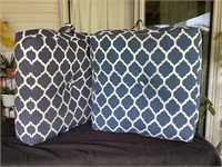 G)  two large overstaffed patio cushions with