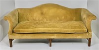 Camel back sofa, down cushion, molded legs,