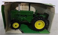 Die-cast John Deere Model M toy tractor