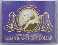 1879 Gold Layered SBA Dollar with Cert.