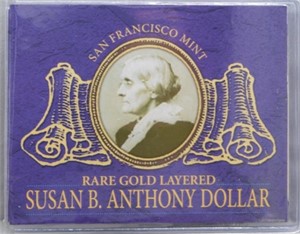 1879 Gold Layered SBA Dollar with Cert.