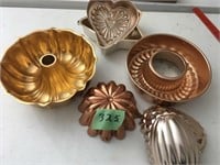 7 jello molds, some copper