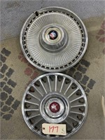 2 Metal Hubcaps 14" 1 is Mustang & Oldsmobile