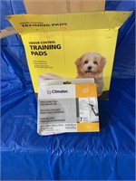 Odour control training pads for a puppy and