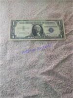 Series 1957 A blue seal silver certificate.