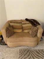 Love seat, pillows, and throw