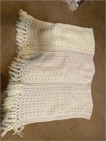 White variegated afghan with fringe
