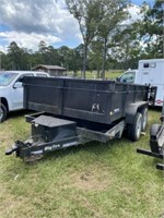 1681) 2011 BigTex dump trailer 12'