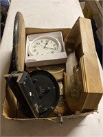 Box with wall clocks