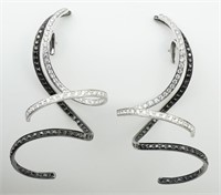 18KWG Black & white diamond spiral drop earrings.