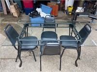 Glass top kitchen table with 4 chairs