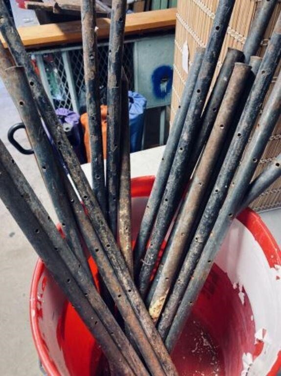 BUCKET OF 17 METAL FORM STAKES WITH HOLES