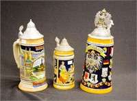 Group three German decorated beer steins