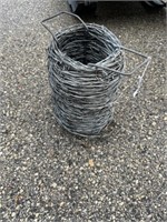 Roll of metal barbed wire