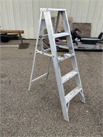Approximately 5 ft aluminum step ladder