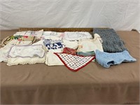 Assorted crochet items and knit scarf