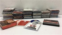 Large Collection of CDs & More K7A