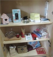 (3) Shelf fulls includes coasters, oriential fan,