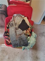 Plastic Tote of Women's Clothing