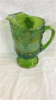 Green carnival glass pitcher