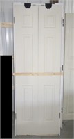 Bifold door unit with jam. Measures 82" x 29.5".
