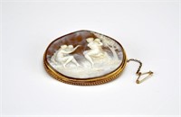 Antique gold framed cameo brooch