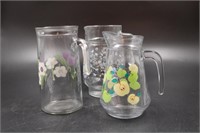 3 GENTLY DECORATED GLASS WATER PITCHERS