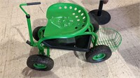 Green garden buggy with a twist metal tractor