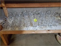 SHELF OF ASSORTED SIZE FOSTORIA SWIRL GLASSES