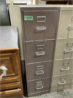 4 drawer tan file cabinet, may have rust