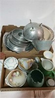 Metal cookware and ceramic dishes