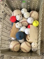 Wire basket with golf balls, racquetball, balls,