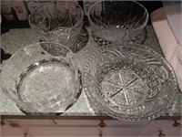 4 crystal and glass bowls 8 inches to 11 inches.