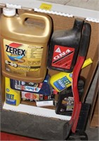 box of misc oils and antifreeze