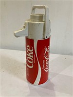 Coca-Cola dispenser.