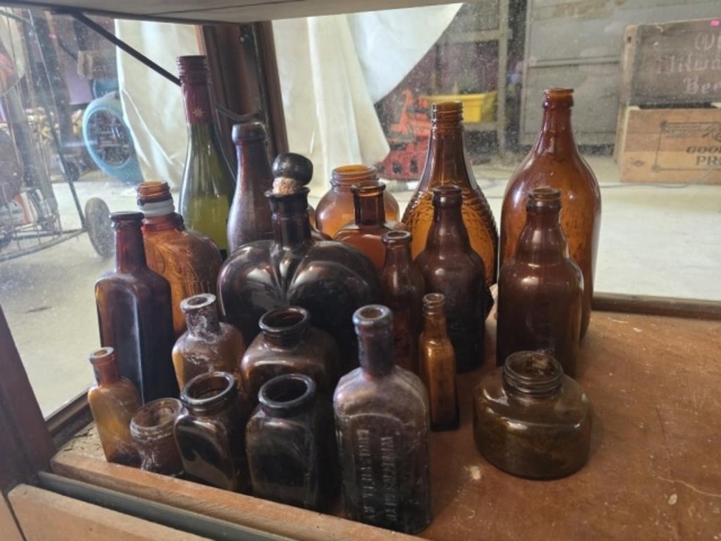 Estate lot of vintage brown bottles