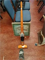 Orange ergo vacuum cleaner