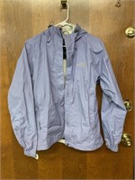 The North Face size Medium Ladies Raincoat, has
