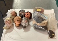 Lot of doll heads, body parts, & wigs