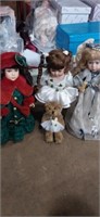 3 porcelain dolls with stands