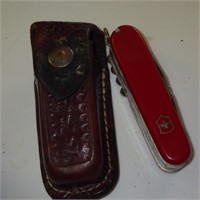 SWISS ARMY KNIFE IN LEATHER SHEATH