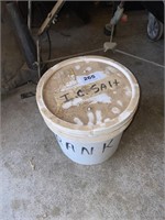 partial pail of ice cream salt