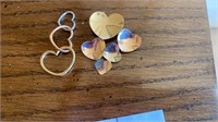 14 k Tri color Heart pendants.