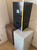 3 two drawer metal filing cabinets and a table