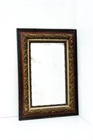 Beveled Older Mirror in Ornately Carved Frame