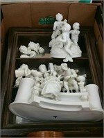 Box of porcelain figurines and shadow box