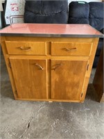 Vintage utility cabinet w/ boomerang design on top