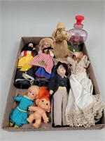 Assorted small dolls and a troll