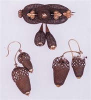 A pair of double-acorn hair jewelry earrings and